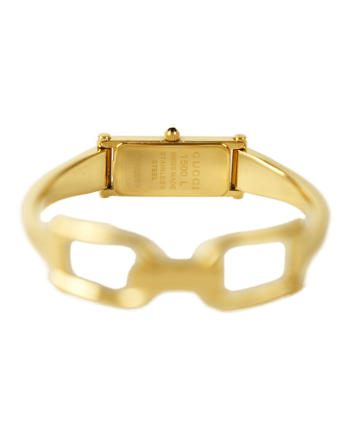 Orologio Gucci bangle in metallo dorato con morsetto sul bracciale e quadrante rettangolare, vista frontale su fondo neutro