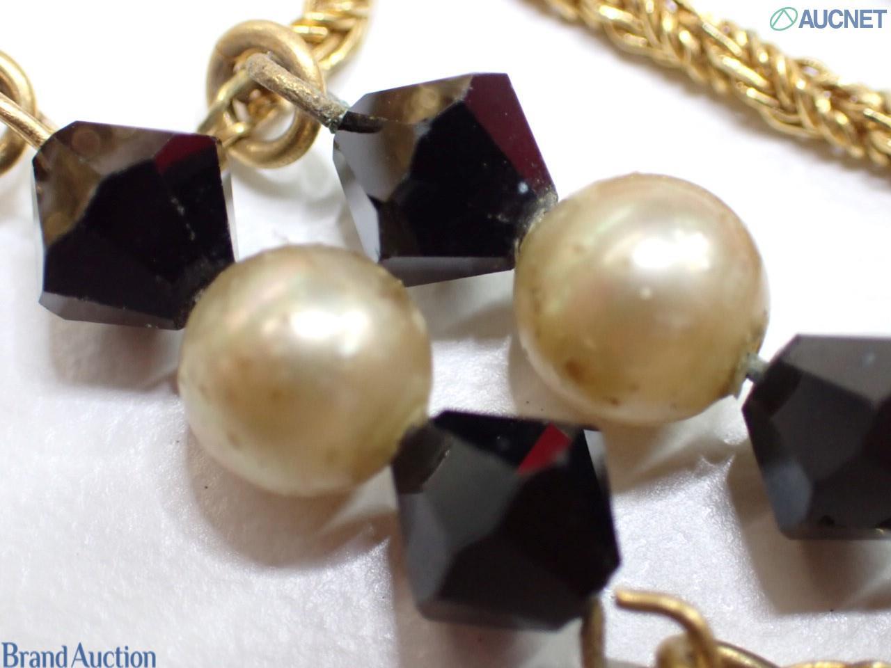 Collana lunga Yves Saint Laurent a catena dorata intrecciata, con perle d'imitazione e perline nere sfaccettate — vista 4