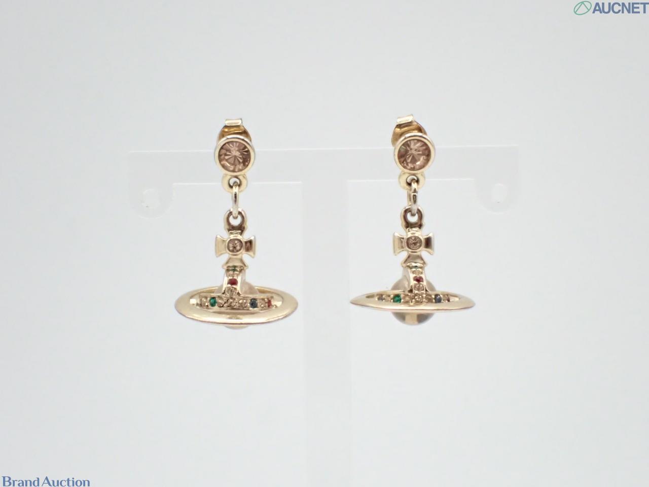 Orecchini pendenti Vivienne Westwood in metallo dorato: globo con croce e anello di piccole pietre colorate.