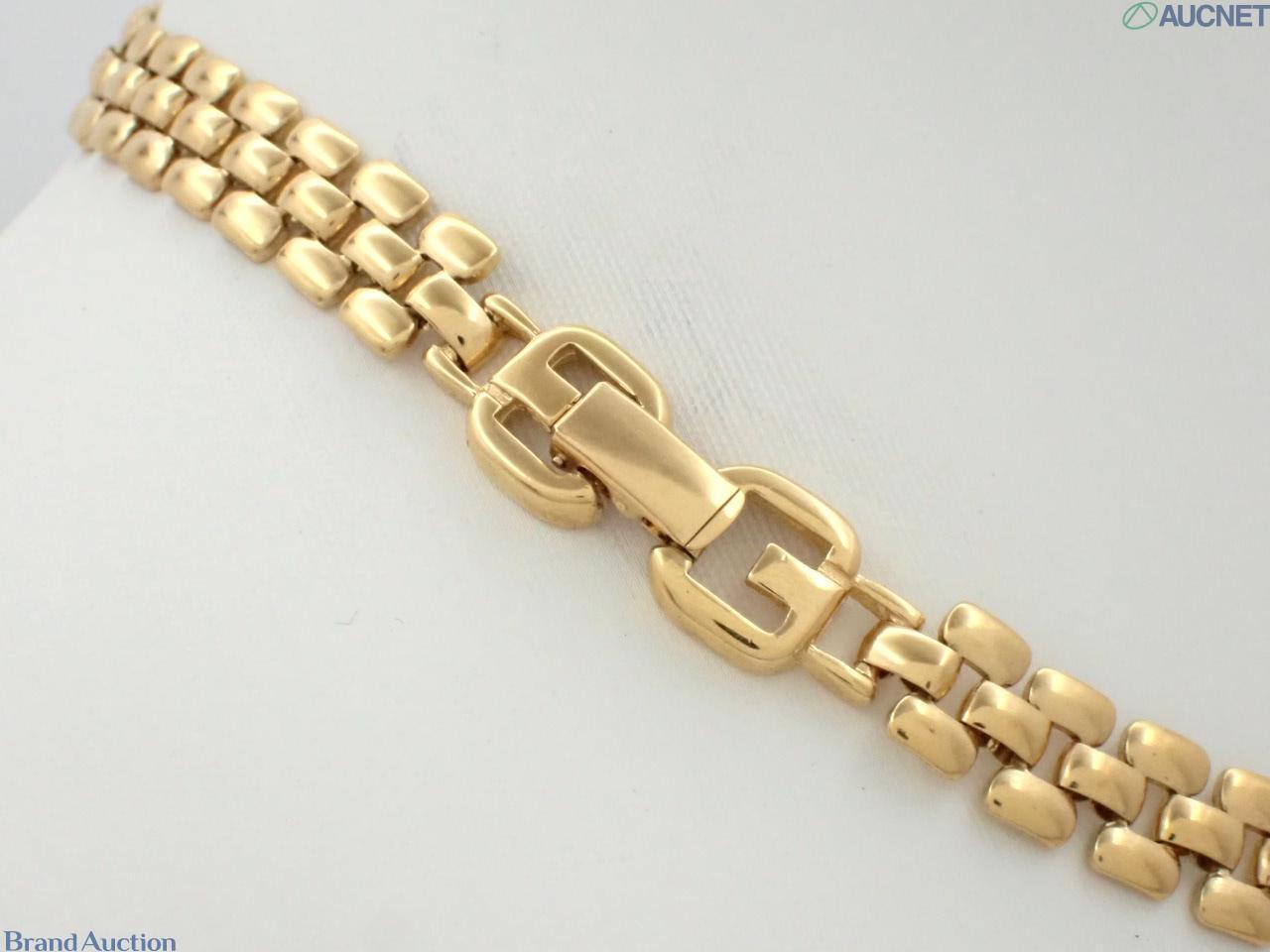 Collana Givenchy a tre file di maglie color oro, pendente rettangolare nero con le quattro G e bordo a cordoncino — vista 2