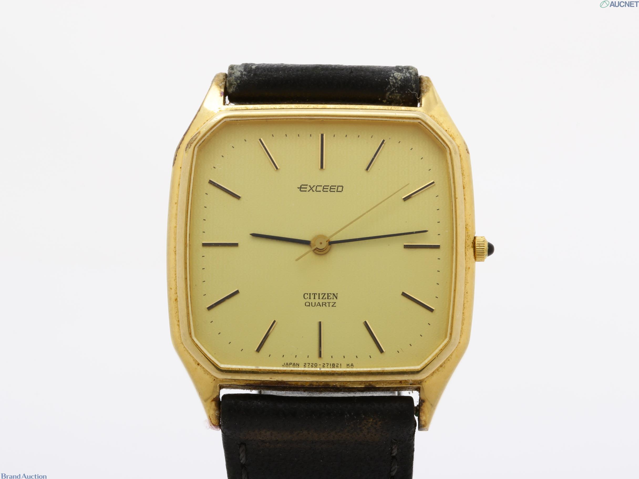 Orologio Citizen Exceed al quarzo, cassa rettangolare dorata, quadrante champagne e cinturino in pelle nera
