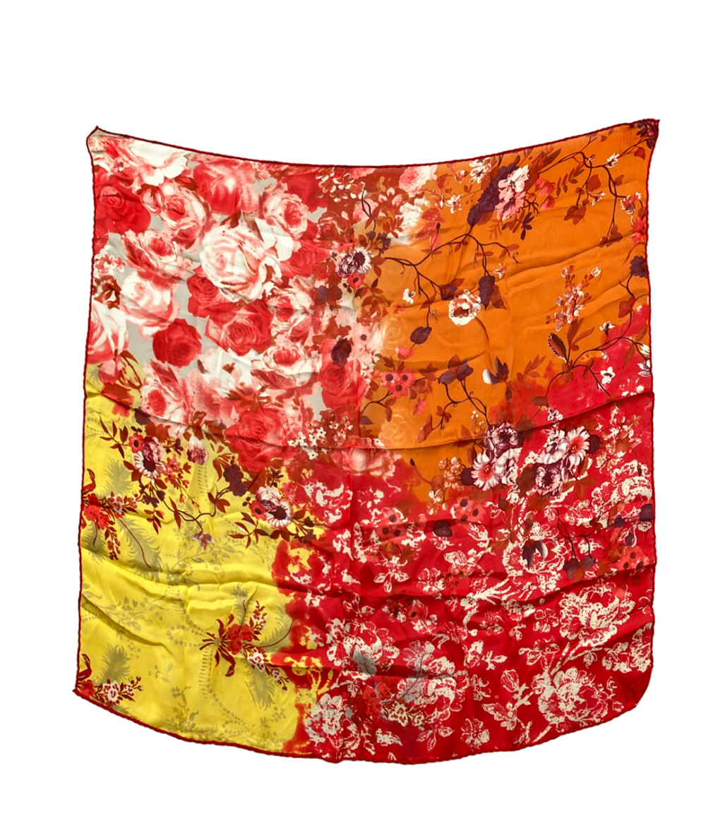 Foulard Christian Dior in seta con stampa floreale rossa, arancio e gialla, bordo arrotolato rosso