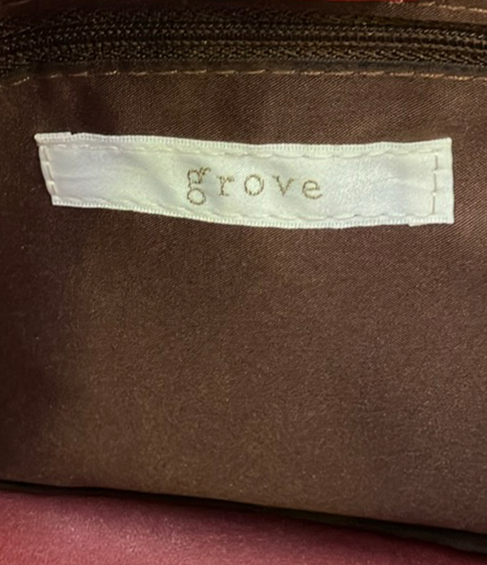 Borsa a spalla Grove rossa a grana fine, linguetta centrale con chiusura girevole dorata e tracolla staccabile in tinta. — vista 6
