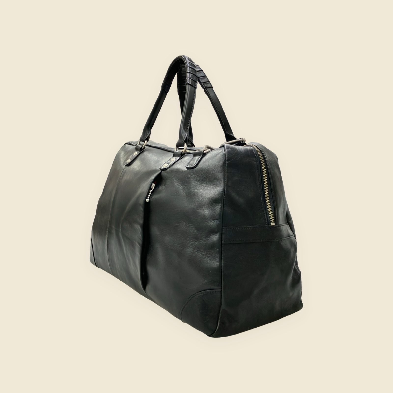 Borsa da viaggio Creed nera a due manici con tracolla larga, chiusura a cerniera e nappina laterale, vista frontale — vista 3