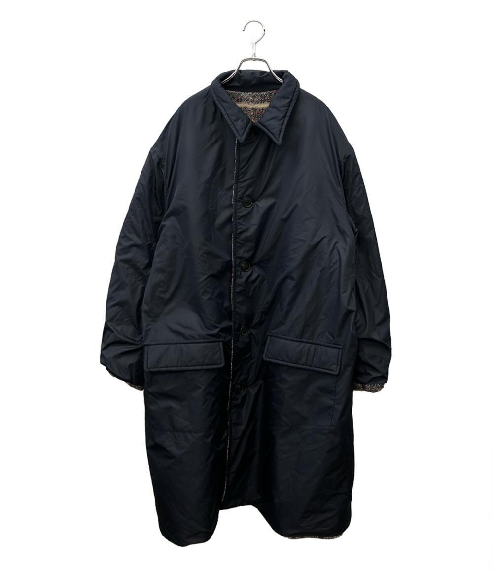 Cappotto Isabel Marant in lana a quadri beige, rosso e blu, colletto blu scuro, appeso a una gruccia su fondo bianco — vista 2