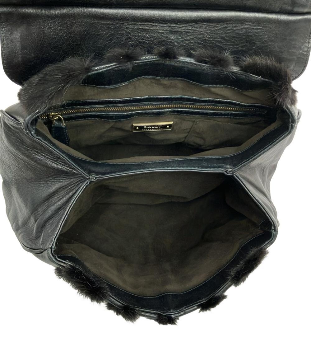 Borsa a mano Bally in pelle nera con manico singolo, chiusura girevole dorata e fasce di pelo scuro a punta sul fronte — vista 5